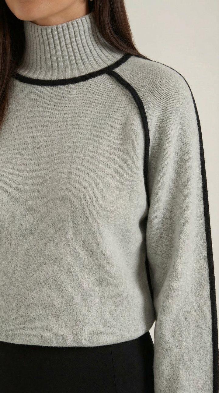 Trui met hoge hals en contrasterende details